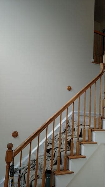 Highly detailed and realistic work that has the added trick of using a large door frame as its picture frame, and that has at the bottom of the frame an actual wood step to continue the painting outside the plane of the canvas. Staircase Painting In Milford, CT by Top Coat Painting LLC