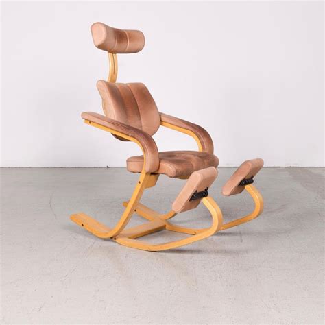 Try a gravity modern lounger today in that tucked away office corner or loft space. Stokke Gravity Balans Designer Leather Wood Rocking Chair Brown by Peter Opsvik For Sale at 1stdibs