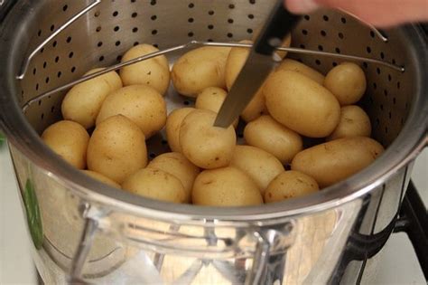 Place a steamer basket or colander in a large pot. How to Steam Potatoes - Gluten-Free Baking