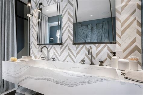Check spelling or type a new query. Master Bathroom Features Herringbone Tile Wall and Marble ...