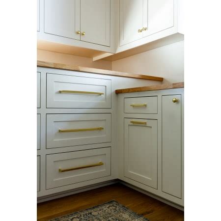 In stock cabinets, buy today install tomorrow. Baldwin 4976030 Polished Brass Palm Springs 6 Inch Center to Center Handle Cabinet Pull from the ...