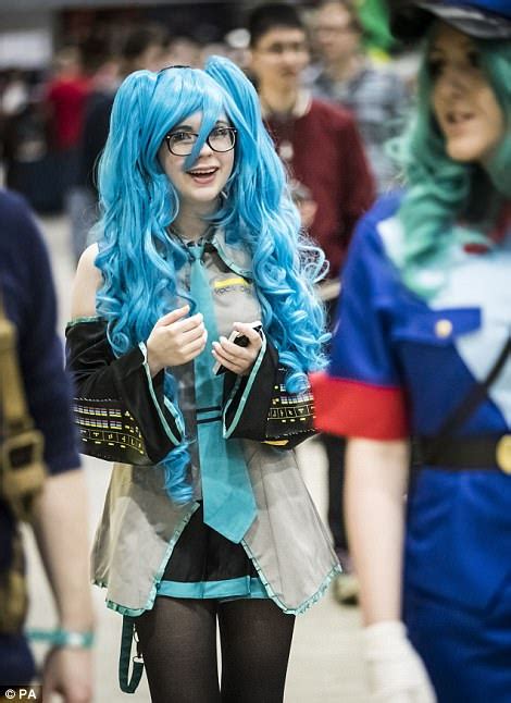 Who was your favorite blue haired anime character? Fantasy obsessives flock to Comic Con to show off costumes ...