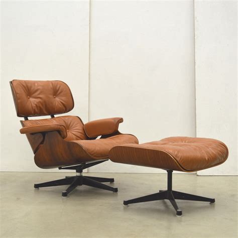 This includes the herman miller eames lounge chair and ottoman with rosewood, oiled walnut, or oiled santos palisander veneer. Lounge chair by Charles & Ray Eames for Herman Miller ...