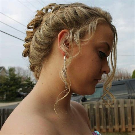 It is simple to create. Prom 2014. Loose side braid going into low pinned curls ...