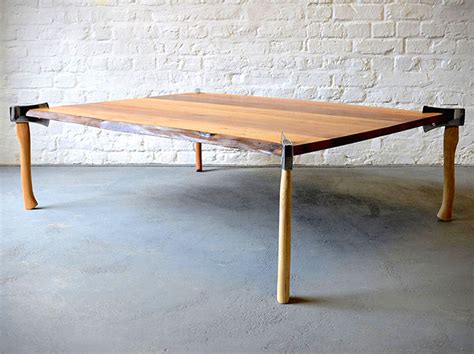 The glass surfaces on the tables. Instead of Legs, The Woodsman Coffee Table is Held Up with ...