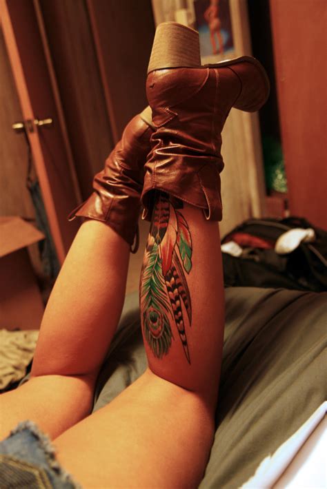 45 majestic geometric feather tattoos designs with meaning. Colorful feather on thigh Female tattoo - Female tattoo ...