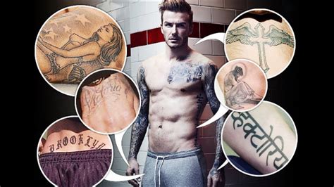 The back of the photo of david beckham visible tattoo with a cross with wings and the name of the second son of «romeo». David Beckham's "Immoral and Vulgar" Tattoos Censored in ...