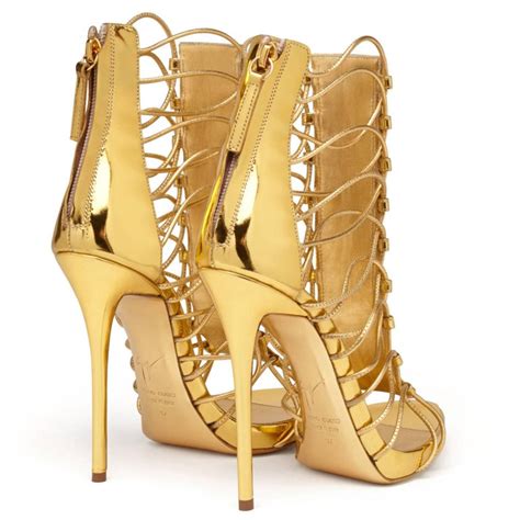 Maybe you would like to learn more about one of these? Giuseppe Zanotti New Gold Leather Gladiator Sandals Heels in Box at 1stdibs