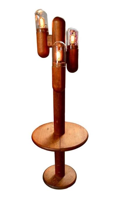Upgrading to modern floor lamps is a bright idea. Cactus Floor Lamp with Table For Sale at 1stdibs