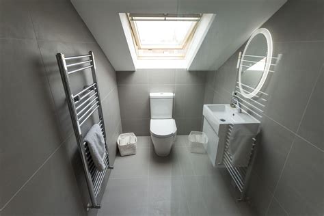 Maybe you would like to learn more about one of these? Grey tiled ensuite shower room to a dormer loft conversion ...