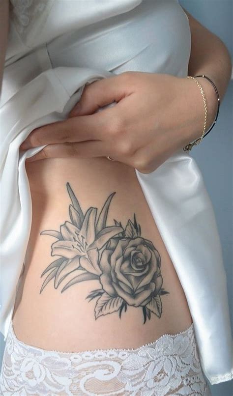 This terrific collection of birth month flower tattoos shows off some of our favorite blooms; Rose & Lily Tattoo | Rose flower tattoos, Lily tattoo ...