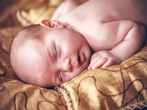 Babies sleep with blankets right from the hospital, but they shouldn't have pillows until they're out of the crib, or somewhere around three. When Can Your Baby Sleep With A Pillow? - Boldsky.com