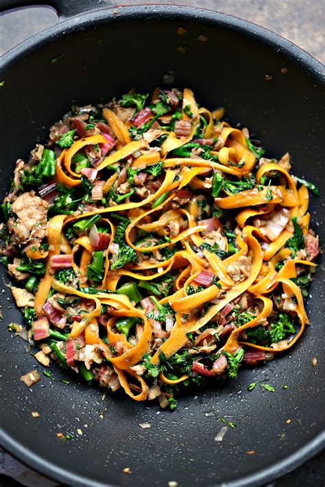 Toss the ingredients from the centre to the side of the wok using a wooden spatula. Easy Tuna Stir-Fry Bowls
