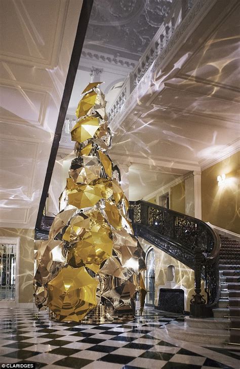 Christmas tree shop umbrella anchor. Burberry unveil metallic umbrella design Christmas tree at ...