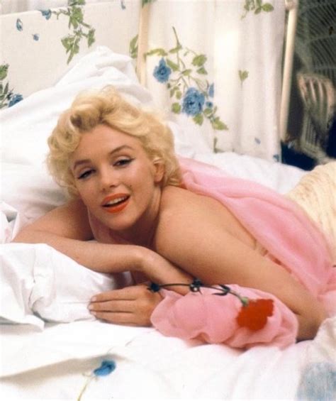Portrait of american actress marilyn monroe as she lies on a bed wrapped in a white sheet, hollywood, los angeles, california, november 1961. Marilyn: the icon | BFI