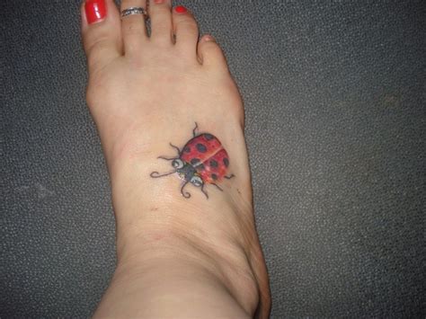 Nice color flower and red ladybug tattoos. Ladybug Tattoos Designs, Ideas and Meaning | Tattoos For You
