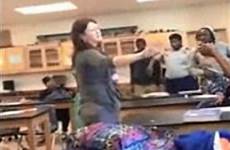 teacher classroom stuck her middle fight shows shocking helping down school caught students girls fighting helpless two do high scroll