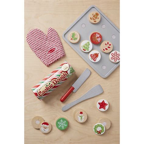 Slice and pretend to bake a dozen wooden cookies, then decorate them for christmas! Melissa & Doug Slice and Bake Christmas Cookie Baking Set & Reviews | Wayfair