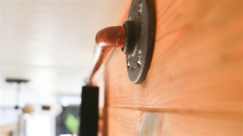 The barn door hardware is from national hardware and was super simple to install. DIY Sliding Barn Door Hardware | MountainModernLife.com