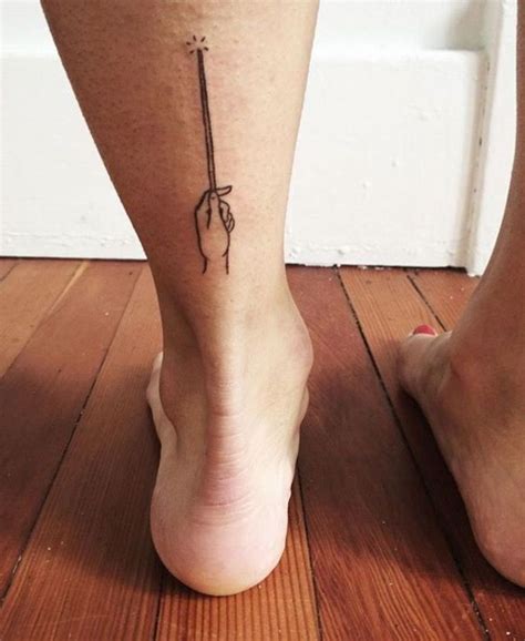 Mindy white is a huge harry potter fan and she has a tattoo behind her right ear of the trio of stars which appear in the harry potter book series. Harry Potter Tattoo Ideas and Photos! | TatRing