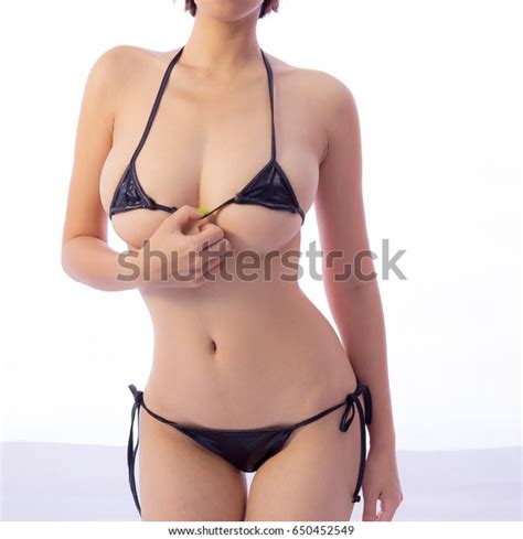 Guys have been comparing their guns since 1973, and their pecs since 1949. Sexy Lady Mini Bikini Body Parts Stock Photo (Edit Now ...