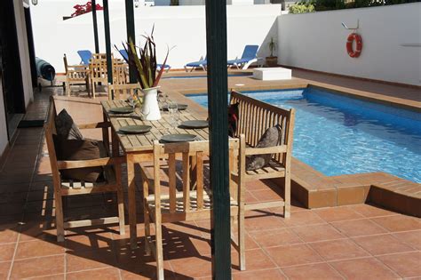 The single storey villa consists of a kitchen with a dining table and a spacious lounge with doors leading to the terrace, jacuzzi and pool area. 5 Bedroom Private Villa | Costa Teguise | Lanzarote ...