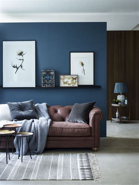 The most obvious color to complement a brown couch is white. 33 Cool Brown And Blue Living Room Designs - DigsDigs