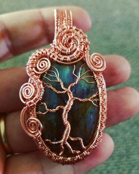 As the wind blows a tree, the tree bends in the wind and the outer fibres of the trunk. "Colors of the Wind" tree of life pendant, a labradorite ...