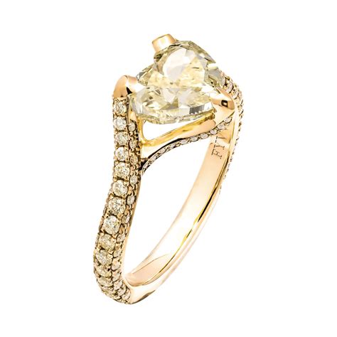 Yellow gold contains a brightness and warmth that contrasts perfectly. GIA Certified 2.06 Carat Fancy Yellow Heart Shape Diamond ...