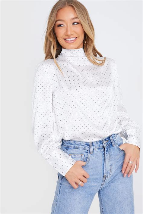 Check out our silk satin blouse selection for the very best in unique or custom, handmade pieces from our blouses shops. White Polka Dot High Neck Satin Blouse | In The Style Ireland