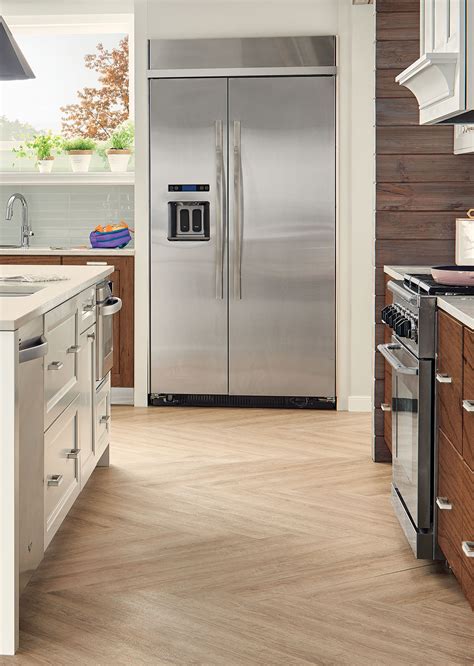 Cut into strips and push the refrigerators across the floor, keeping a close eye that the wheels don't fall off the masonite board. Before or After Cabinet Installation? Four Considerations to Help Finalizing Your Flooring ...