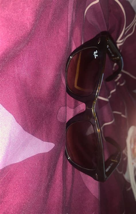 Ray bans are good and the wayfarer glasses is back in style as far as luxury brands, well it varies by brand. Barely worn Afew scratches Brown | Ray ban sunglasses ...