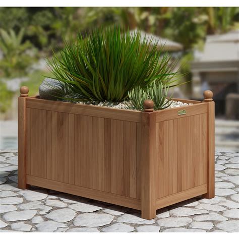 Constructed of a blend of natural stone, resin and fiberglass, the planter is lightweight, watertight and weather resistant. Natural Teak Outdoor Planter-TK8108 - The Home Depot