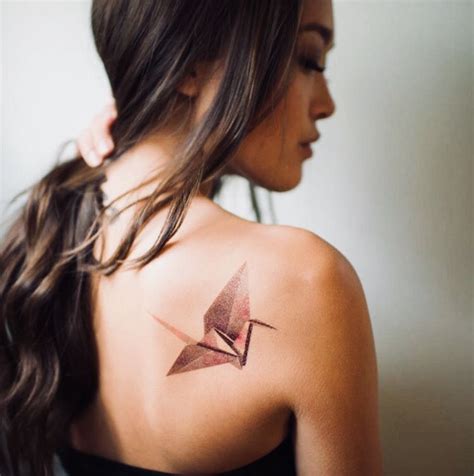 That is the reason why most men choose a smaller tattoo in this placement. Colorful Oragami Bird Shoulder Blade Tattoo | Origami ...