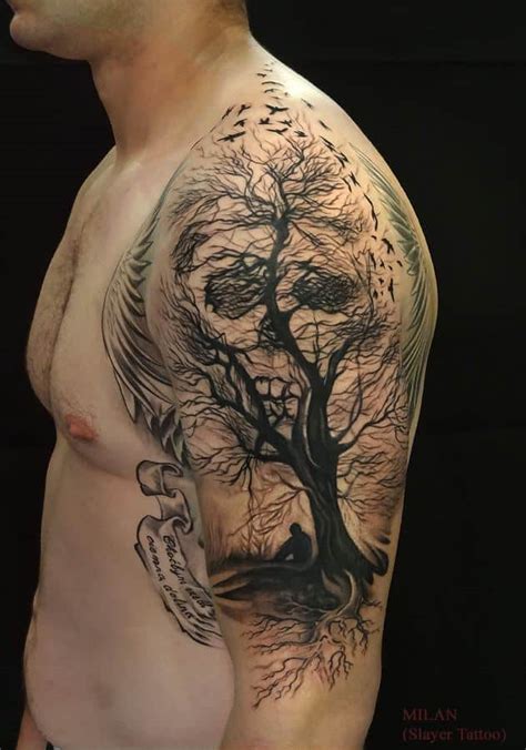 The tree is bare and just has a topknot of foliage at the top. Tree Tattoos for Men - Ideas and Designs for guys